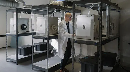 Man next to machine.jfif